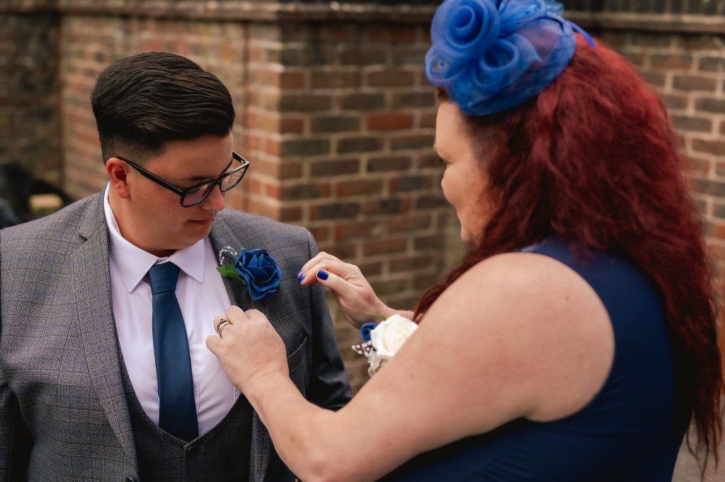 Wedding guest laughing during a joyful candid moment